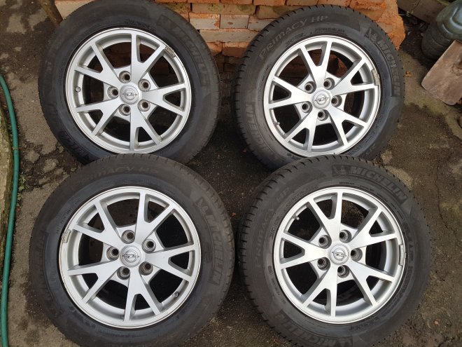 8. Оригінальні диски Opel insignia R16 з резиноюPCD 5x1206,5jET 41DIA 67