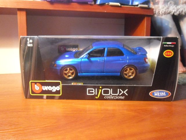 Subaru Impreza WRX 1:24 Bburago ()-90.Subaru Impreza WRX STI 2005 1:24 Motor Max -90